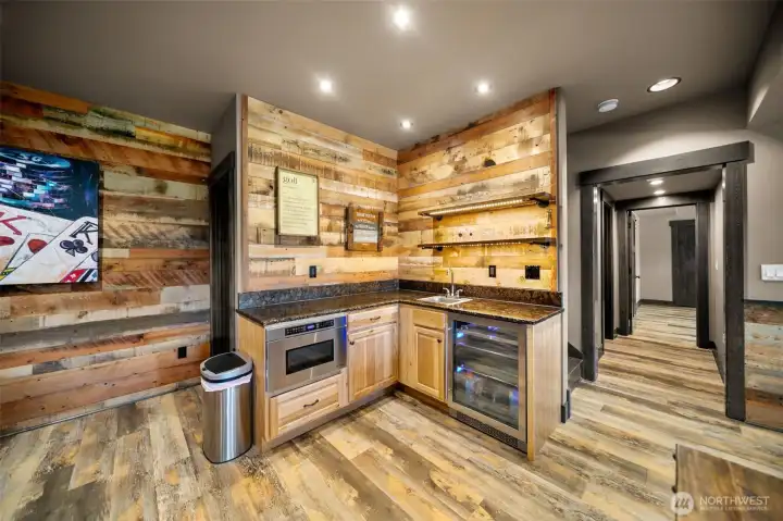 Kitchenette with sink, wine cooler and microwave