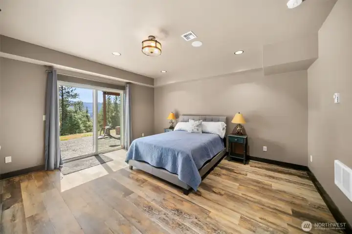 Second Primary Bedroom on lower level with direct access outside and mountain views