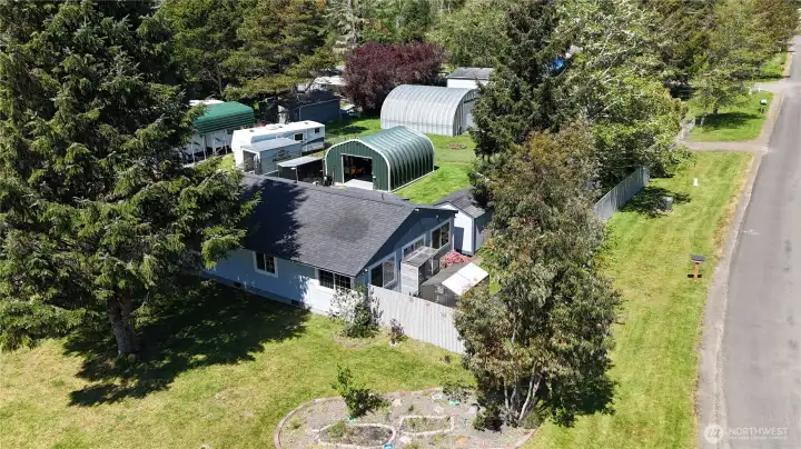 Home is nestled in a lovely Tree lined yard completely fenced.