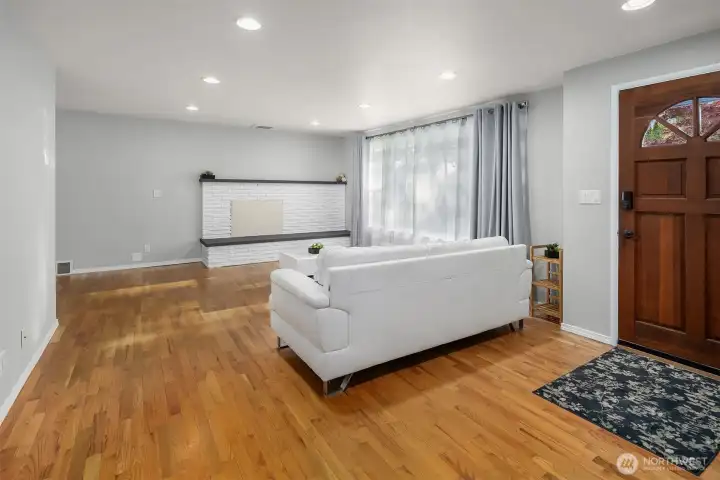 Another view of the main entrance and living room.