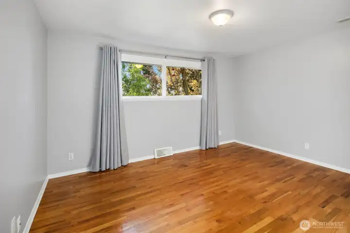 The primary bedroom is on the main level and has two closets.