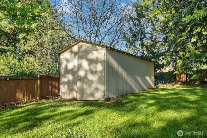 Extra large shed in the back is perfect for tools, bikes, equipment.