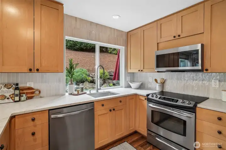 New countertops and backsplash. New countertops and backsplash.
