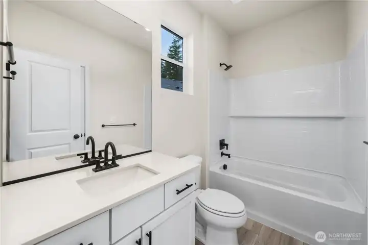 Photos from previously completed home in another community. Actual colors and finishes may vary. See site agent for details.
