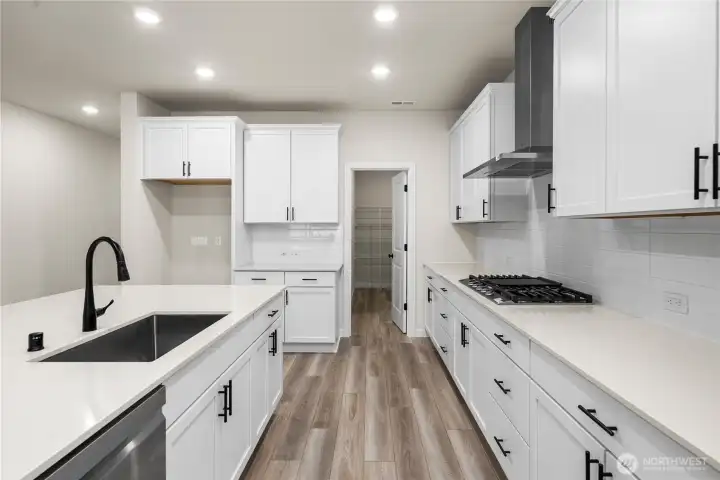 Photos from previously completed home in another community. Actual colors and finishes may vary. See site agent for details.