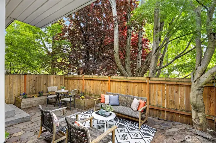 Tucked up from the quiet street behind beautiful trees for extra privacy find this 1999 built townhome. Built as a house alternative this townhome has an extra large fully-fenced backyard.