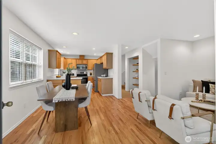 Inside real oak hardwood floors flow through a spacious kitchen dining and living area. Multiple configuration options, fits a sectional couch and full 6-8 seating dining table.