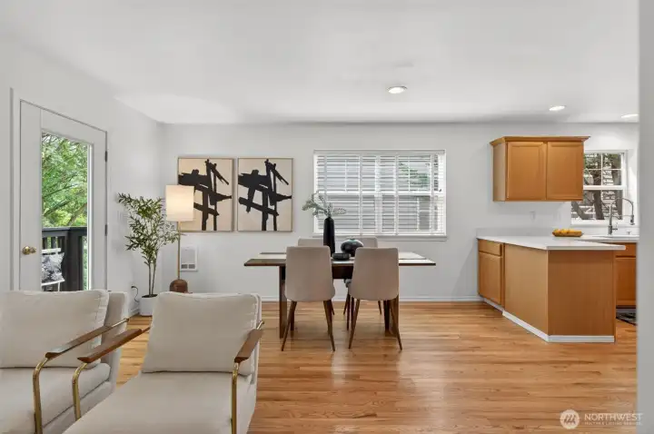 To the left is a cute balcony with space for a BBQ