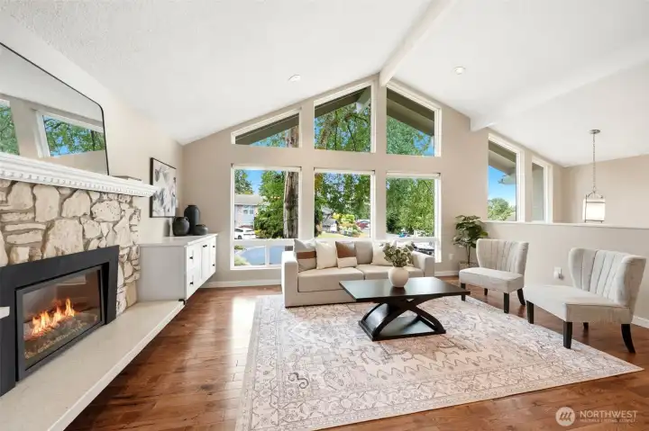 A beautiful blend of warmth and elegance with vaulted ceilings, hardwood floors, and abundant natural light A beautiful blend of warmth and elegance with vaulted ceilings, hardwood floors, and abundant natural light