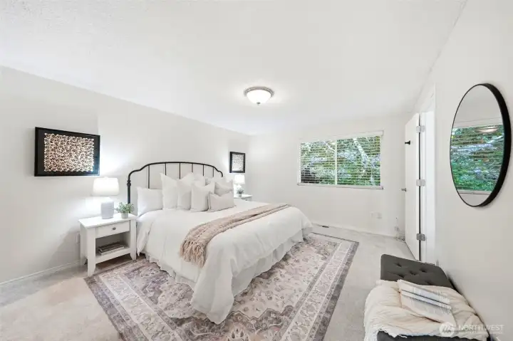 Relax and unwind in the spacious primary suite complete with a walk-in closet and beautifully updated ensuite bathroom Relax and unwind in the spacious primary suite complete with a walk-in closet and beautifully updated ensuite bathroom