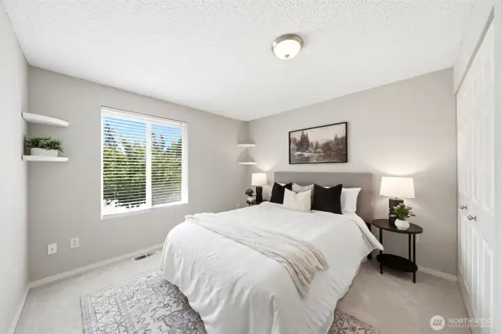 Generously bedroom upstairs featuring brand new carpet, and fresh interior paint Generously bedroom upstairs featuring brand new carpet, and fresh interior paint