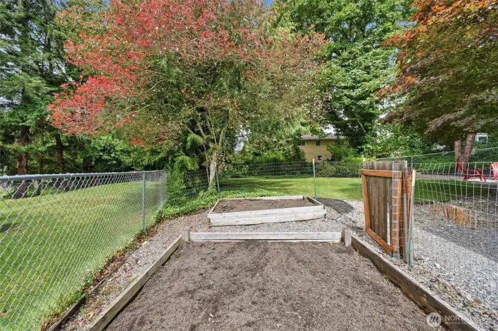 Raised garden beds with drip irrigation, prepped and ready for your favorite flowers, herbs, and vegetables Raised garden beds with drip irrigation, prepped and ready for your favorite flowers, herbs, and vegetables