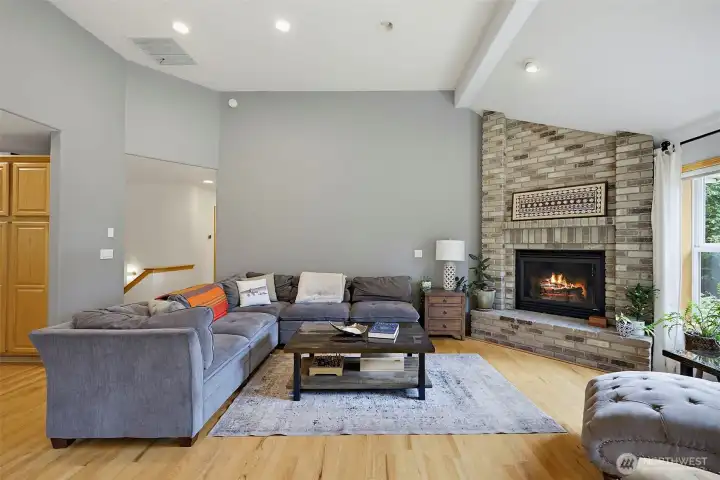 Fresh interior paint throughout, gas fireplace with brick hearth the home makes this family room warm & inviting.