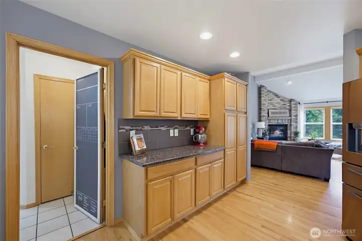 Nicely tucked away off the kitchen area is the laundry room with plenty of storage options.