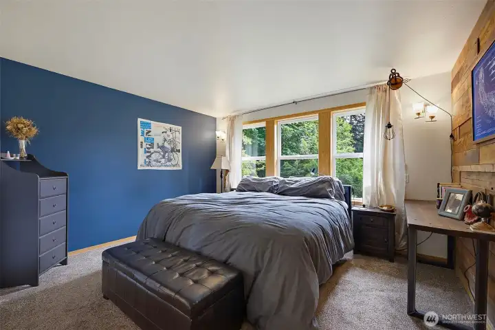 Very large main level primary suite with plenty of natural lighting flooding this room. NEW paint & NEW carpeting throughout this home.