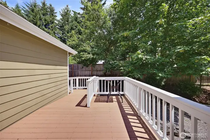 Private deck on side of home off bedroom #2 with ramp for easy access.