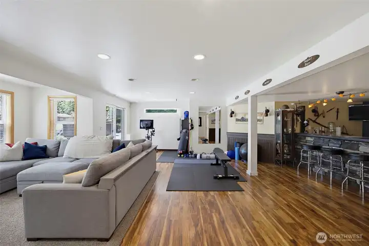The versatile lower-level bonus room offers endless possibilities to fit your lifestyle. Whether you envision a home gym, game room with a pool table, media room for movie nights, home office, or a cozy lounge, this flexible space is ready to become whatever you need.