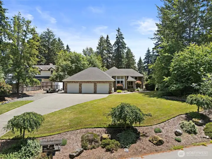 Mature landscaping, RV parking & plenty of yard to enjoy outdoor playtime.