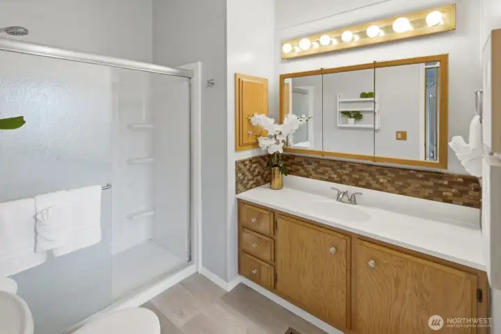 Beautifully updated primary ensuite bath with walk-in shower Beautifully updated primary ensuite bath with walk-in shower