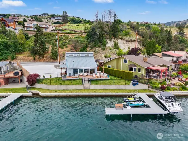 Ultimate lakefront living—just steps to your private 100-foot beachfront.