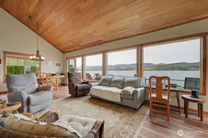 Living room with view into dining room