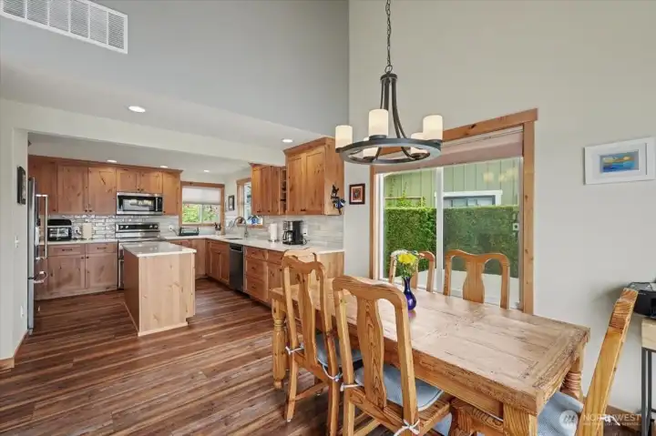 Bright, open layout offering a seamless view from the dining room straight into the kitchen.