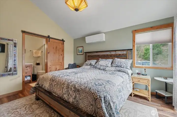 Spacious primary bedroom complete with a private en suite bath.