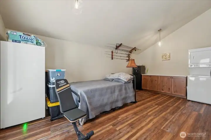 Versatile bonus room perfect for a home office, playroom, extra storage, or a dedicated laundry room.
