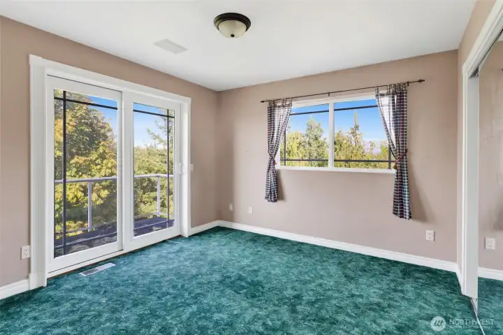 Upstairs bedroom with balcony