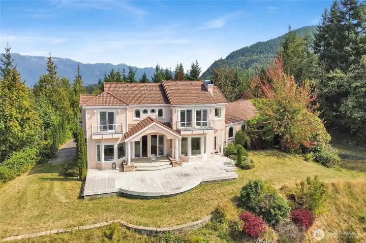 Balconies, expansive deck, room for improvement - this estate has it all