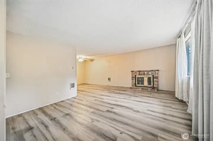 Large living room with a fireplace. Large living room with a fireplace.
