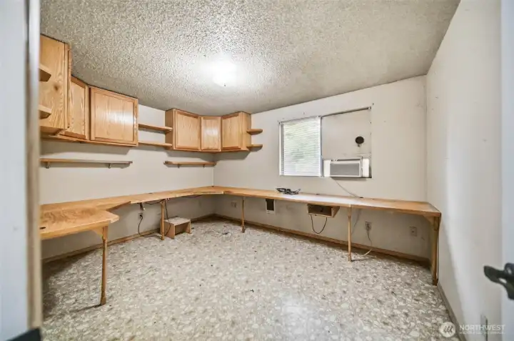 Extra room with a closet offers endless possibilities! The built-in desk makes it ideal as a home office, craft room, study, or hobby space. Extra room with a closet offers endless possibilities! The built-in desk makes it ideal as a home office, craft room, study, or hobby space.