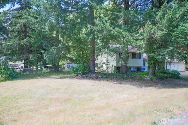 Another view showing your home and large lot. Another view showing your home and large lot.