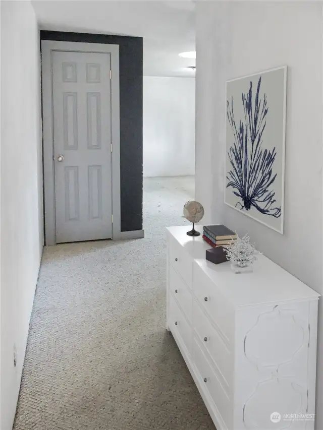 Hallway from bonus room to additional living space (virtually staged).