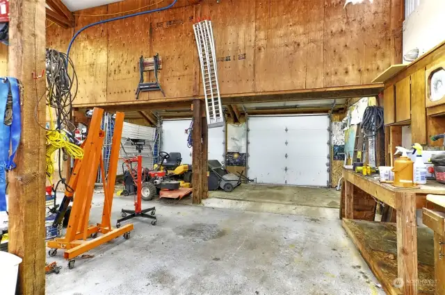 Another look at the side of the garage, to garage doors to remove lawn mowers, tractors all the toys.