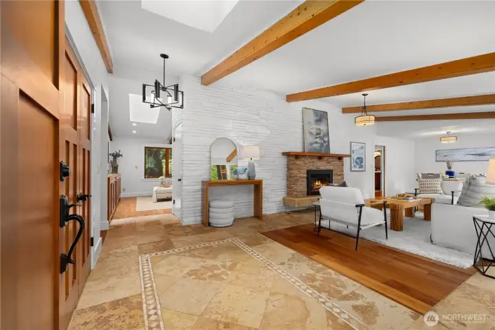 Back to the front entry to the house. Exposed beams and a welcoming fireplace.