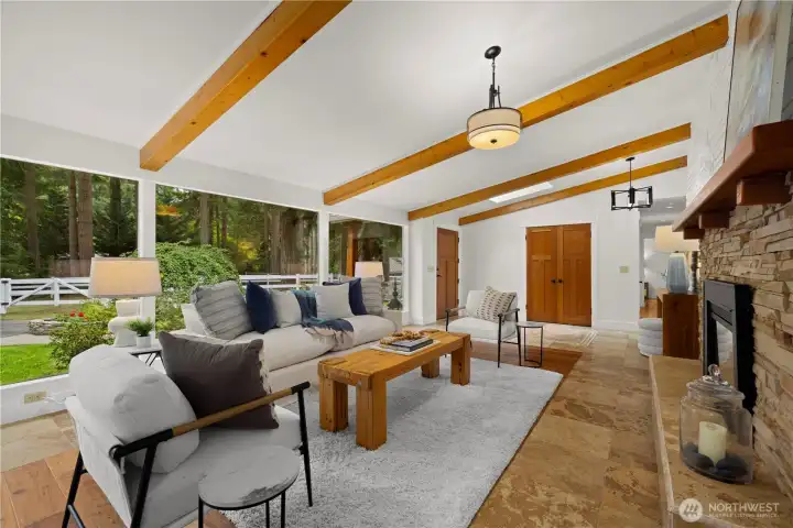 Floor to ceiling windows in the front room let in tons of natural light. Premium fir doors throughout.