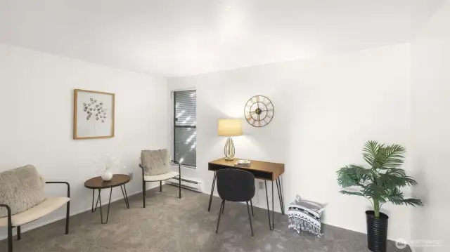 Just off the living room, French doors open to office/3rd bedroom.