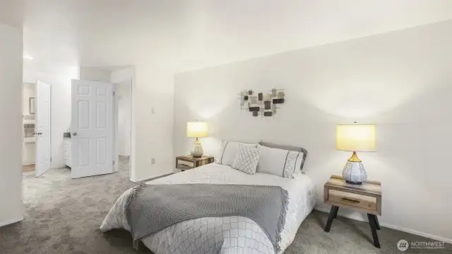 Another angle of your Primary Suite showcasing the abundance of natural light that beams into this space.