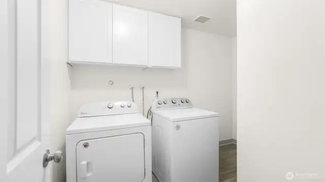 Large utility room with storage & appliances stay!