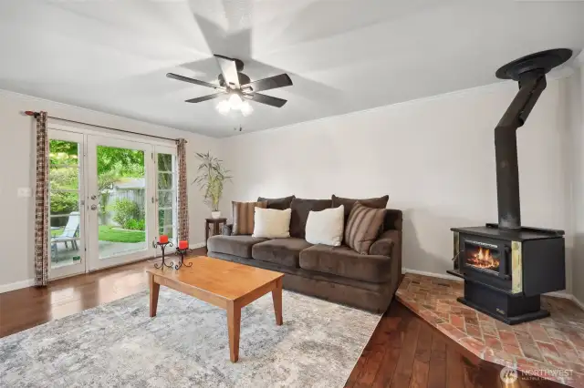 In the great room you have a wood burning fireplace and backyard access
