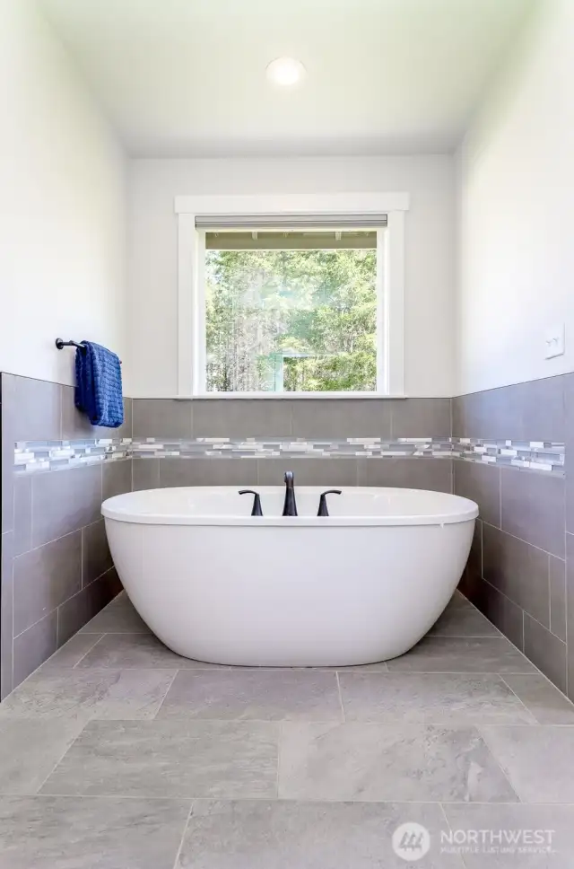 Primary bath large soaking tub.