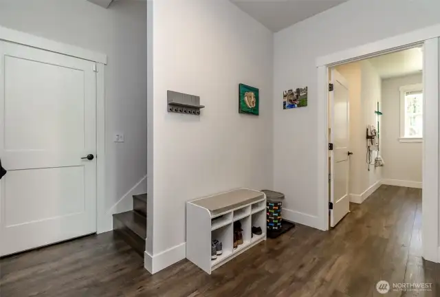 Drop zone at garage entrance, stairway to bonus room and XL laundry room.