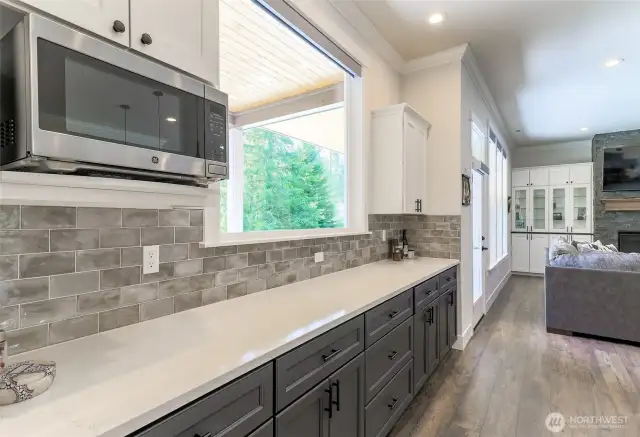 Ample cabinets and great counter space. Coffee bar and work station with a view.