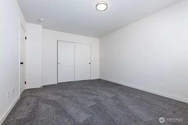 Primary bedroom with closet space.