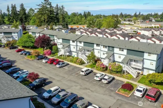 Aerial view of G Building. Designated parking space is 104, in front of unit.