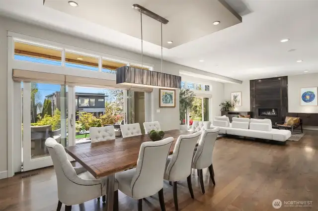 The thoughtfully designed main floor features an open, flowing layout ideal for entertaining, with generous gathering spaces that transition effortlessly to both the front and back yards—perfect for indoor-outdoor living.