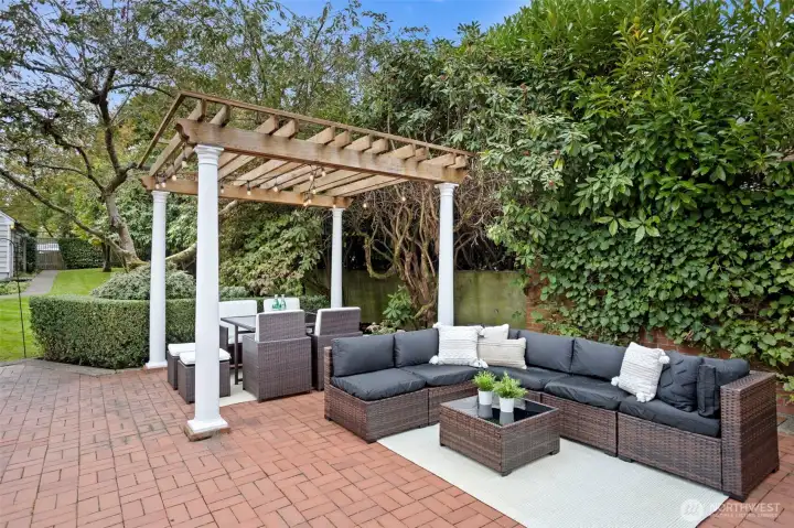 The patio area has room for multiple sets of furniture for your outdoor enjoyment.