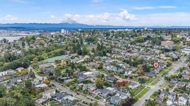 Drone facing East and Southeast.  Annie Wright Academy, Stadium District and downtown Tacoma and Mt. Rainier.