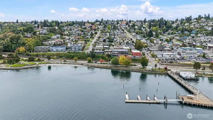 Drone looking from water toward property.
